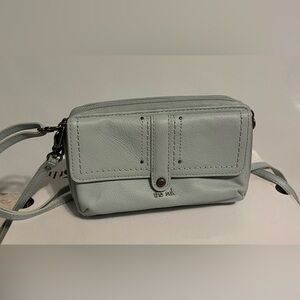 The Sak wallet crossbody bag